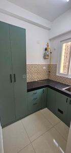 Kitchen Image of 666 Sq.ft 2 BHK Apartment / Flat for rent in Urbanrise Revolution One, Padur Chennai for Rs. 22500