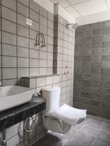 Bedroom One Image of 1050 Sq.ft 2 BHK Apartment / Flat for sale in Shri Radha Aqua Garden, Noida Extension Greater Noida for Rs. 8715000