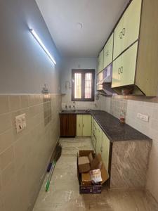 Kitchen Image of 450 Sq.ft 1 BHK Builder Floor for rent in Maurya Enclave, Pitampura New Delhi for Rs. 20000