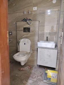 Common Bathroom Image of 800 Sq.ft 2 BHK Apartment / Flat for rent in Rajpur Khurd Village New Delhi for Rs. 19000