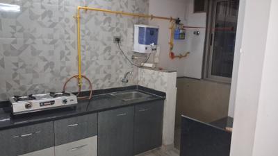 Kitchen Image of 1305 Sq.ft 2 BHK Apartment / Flat for rent in Swagat Queens Land, Sargasan Gandhinagar for Rs. 31000