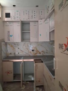 Kitchen Image of 1100 Sq.ft 2 BHK Apartment / Flat for sale in Sector 49 Noida for Rs. 4650000