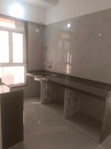 Kitchen Image of 632 Sq.ft 2 BHK Apartment / Flat for sale in Digam Poonam CHSL, Borivali East Mumbai for Rs. 17700000