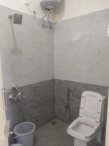 Common Bathroom Image of 360 Sq.ft 1 RK Apartment / Flat for rent in Domlur Layout Bengaluru for Rs. 23000