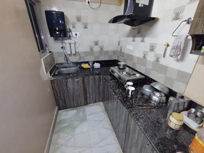 Kitchen Image of 979 Sq.ft 3 BHK Apartment / Flat for sale in Azure Enclave, Behala Kolkata for Rs. 4500000