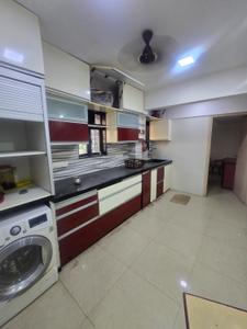Kitchen Image of 1200 Sq.ft 3 BHK Apartment / Flat for rent in Laxman Jhoola Apartment, Andheri West Mumbai for Rs. 120000