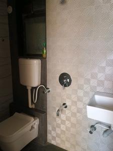 Common Bathroom Image of 583 Sq.ft 1 BHK Apartment / Flat for sale in Rudis Shivalaya Heights, Khidkali Thane for Rs. 3720000