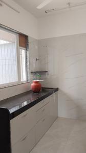 Kitchen Image of 600 Sq.ft 1 BHK Apartment / Flat for sale in Anurag Apartment, Malad West Mumbai for Rs. 13000000