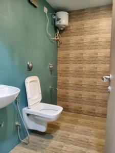 Common Bathroom Image of 700 Sq.ft 2 BHK Apartment / Flat for sale in Lodha Amara, Thane West Thane for Rs. 12700000