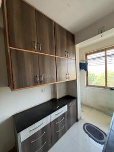 Kitchen Image of 963 Sq.ft 2 BHK Apartment / Flat for rent in Swagat Afford, Sargasan Gandhinagar for Rs. 29000