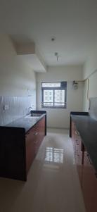 Kitchen Image of 610 Sq.ft 2 BHK Apartment / Flat for sale in Kalptaru Srishti Namah, Mira Road East Mira Bhayandar for Rs. 14400000