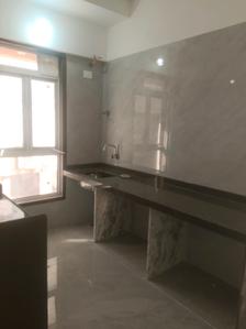 Kitchen Image of 652 Sq.ft 2 BHK Apartment / Flat for sale in Digam Poonam CHSL, Borivali East Mumbai for Rs. 17795000