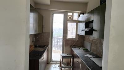 Kitchen Image of 1345 Sq.ft 3 BHK Apartment / Flat for rent in Phase 2 Noida for Rs. 36000