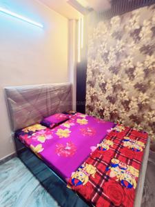 Bedroom Image of 325 Sq.ft 1 BHK Builder Floor for rent in Sector 5 Rohini New Delhi for Rs. 15500