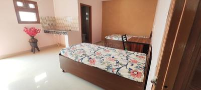 Bedroom Image of Shiv niwas pg in Sector 128, Noida