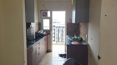 Kitchen Image of 1185 Sq.ft 3 BHK Apartment / Flat for sale in Amrapali Centurian Park, Noida Extension Greater Noida for Rs. 8500000