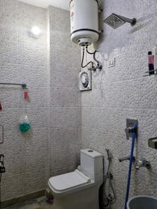 Common Bathroom Image of 650 Sq.ft 2 BHK Builder Floor for rent in Tilak Nagar New Delhi for Rs. 24999
