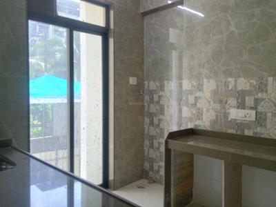 Kitchen Image of 1050 Sq.ft 2 BHK Apartment / Flat for sale in Paradise Sai World Legend Phase 1, Ulhasnagar Thane for Rs. 9000000