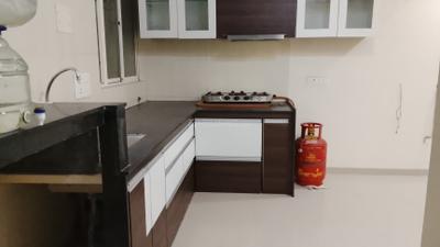 Kitchen Image of 750 Sq.ft 2 BHK Apartment / Flat for rent in JKG Purvarang, Wagholi Pune for Rs. 20000