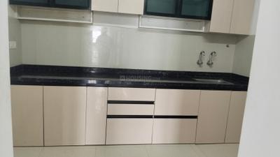 Kitchen Image of 850 Sq.ft 2 BHK Apartment / Flat for rent in Kosmic Kourtyard Phase 1, Wagholi Pune for Rs. 19999