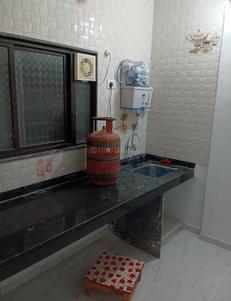 Kitchen Image of 600 Sq.ft 1 BHK Independent House for rent in Marunji Pune for Rs. 16000