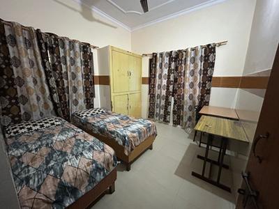 Bedroom Image of Omjee Paying Guest in Garhi Cantt, Dehradun