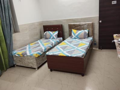Bedroom Image of COMFORT AND STAY PG  in Sector 48, Gurgaon
