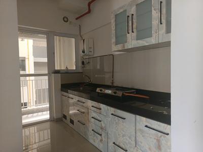 Kitchen Image of 800 Sq.ft 2 BHK Apartment / Flat for rent in Godrej Greens, Pisoli Pune for Rs. 17000