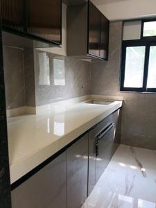 Kitchen Image of 700 Sq.ft 1 BHK Apartment / Flat for sale in Man Opus, Mira Road East Mira Bhayandar for Rs. 7300000