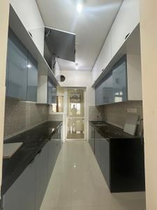 Kitchen Image of 900 Sq.ft 2 BHK Apartment / Flat for rent in Mamurdi Pune for Rs. 18000