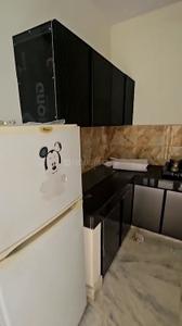 Kitchen Image of 1100 Sq.ft 2 BHK Builder Floor for rent in Rajouri Garden New Delhi for Rs. 31000