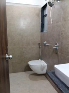 Common Bathroom Image of 566 Sq.ft 1 BHK Apartment / Flat for sale in Raj Shree Shashwat, Mira Road East Mira Bhayandar for Rs. 7700000