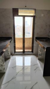 Kitchen Image of 721 Sq.ft 1 BHK Apartment / Flat for sale in Paradigm Pushpanjali Residency Phase III, Thane West Thane for Rs. 6390000