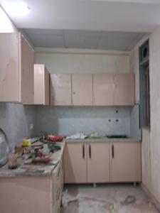 Kitchen Image of 980 Sq.ft 2 BHK Apartment / Flat for sale in GCM Gomati Apartment, Sector 49 Noida for Rs. 3850000