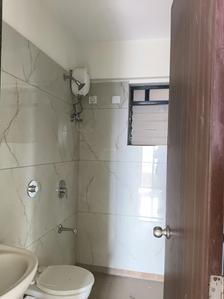 Common Bathroom Image of 900 Sq.ft 2 BHK Apartment / Flat for sale in Raunak City Sector IV D8, Kalyan West Kalyan for Rs. 5500000