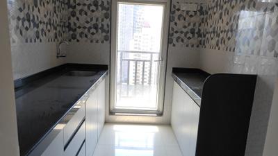 Kitchen Image of 550 Sq.ft 1 BHK Apartment / Flat for rent in Raunak Bliss, Thane West Thane for Rs. 19000
