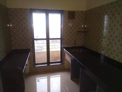Kitchen Image of 880 Sq.ft 2 BHK Apartment / Flat for sale in Mahesh Shree Gandeva Tower, Titwala Thane for Rs. 3600000