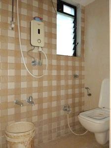 Common Bathroom Image of 950 Sq.ft 2 BHK Apartment / Flat for sale in Raunak Unnathi Woods Phase 1 and 2, Kasarvadavali Thane for Rs. 8500000