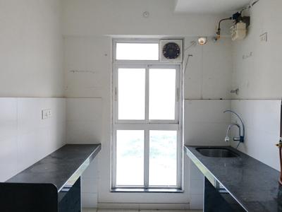 Kitchen Image of 700 Sq.ft 1.5 BHK Apartment / Flat for rent in Godrej Emerald, Kasarvadavali Thane for Rs. 26500