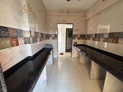 Kitchen Image of 697 Sq.ft 1 BHK Apartment / Flat for rent in Dombivli East Thane for Rs. 14000