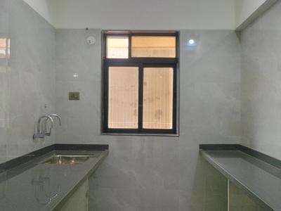 Kitchen Image of 680 Sq.ft 1 BHK Apartment / Flat for sale in Sai Om Sai Towers, Ambernath East Ambernath for Rs. 2299000