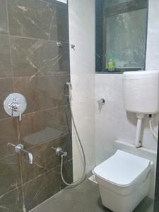 Common Bathroom Image of 1110 Sq.ft 3 BHK Apartment / Flat for sale in Shreeji Krishna Nayan Complex Phase I, Badlapur East Badlapur for Rs. 5150000