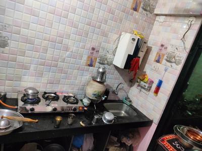 Kitchen Image of 915 Sq.ft 2 BHK Apartment / Flat for sale in Bhavani Mohan Heights Phase 1, Titwala Thane for Rs. 4500000