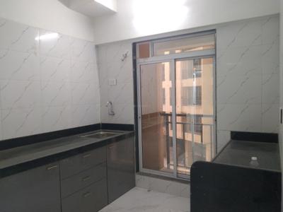 Kitchen Image of 705 Sq.ft 1 BHK Apartment / Flat for sale in Munish Emonics Tower, Vasai East Vasai for Rs. 3900000