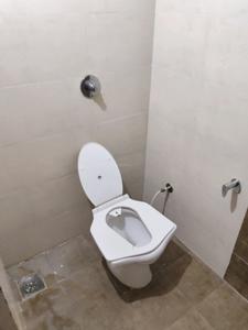 Common Bathroom Image of 640 Sq.ft 2 BHK Apartment / Flat for rent in PSY Pramukh Horizon, Sargasan Gandhinagar for Rs. 22000