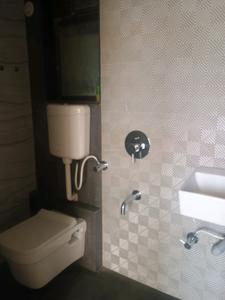 Common Bathroom Image of 671 Sq.ft 1 BHK Apartment / Flat for sale in Venus Skky City Phase I, Dombivli East Thane for Rs. 3799000