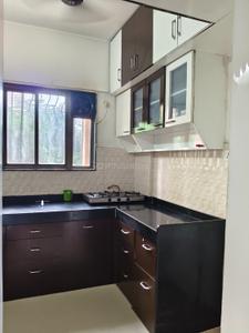 Kitchen Image of 650 Sq.ft 1 BHK Apartment / Flat for rent in KUL Ecoloch, Mahalunge Pune for Rs. 20000