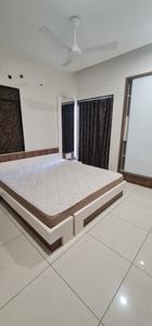 Bedroom Image of 1200 Sq.ft 3 BHK Apartment / Flat for rent in Jayavardhini Heights, Hari Nagar Rajkot for Rs. 30000