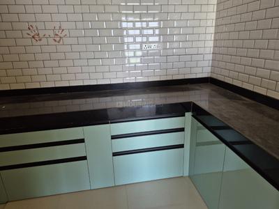 Kitchen Image of 800 Sq.ft 2 BHK Apartment / Flat for sale in Ravinanda Skylights, Wagholi Pune for Rs. 6300000