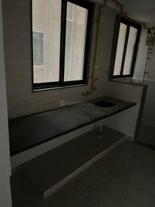 Kitchen Image of 1197 Sq.ft 2 BHK Apartment / Flat for sale in Dev Home Town 4, Chandkheda Ahmedabad for Rs. 4800000